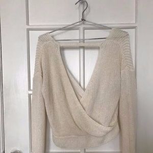 KNIT CROSSOVER SWEATER
